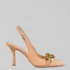DÉCOLLETÉ IN NABUK CON ACCESSORIO CATENA ORO