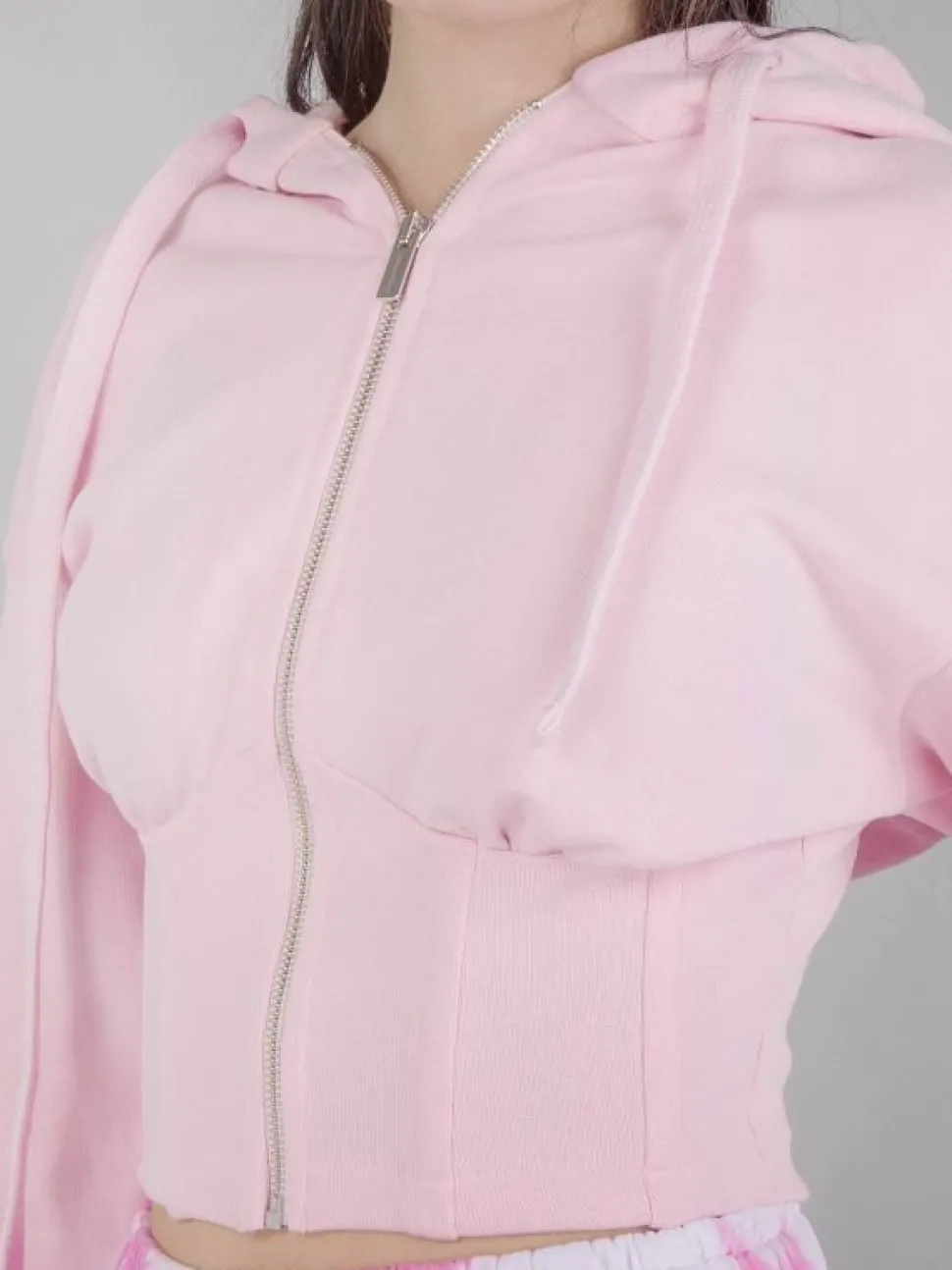 FELPA CORTA BUSTIER CON CAPPUCCIO