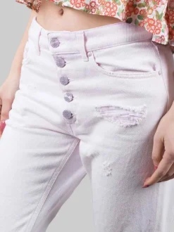 JEANS KOONS ROSA IN COTONE LAVATO CON ROTTURE E BOTTONI GIOIELLO