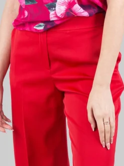 PANTALONI FLARE ROSSI IN TESSUTO LUCIDO A VITA ALTA