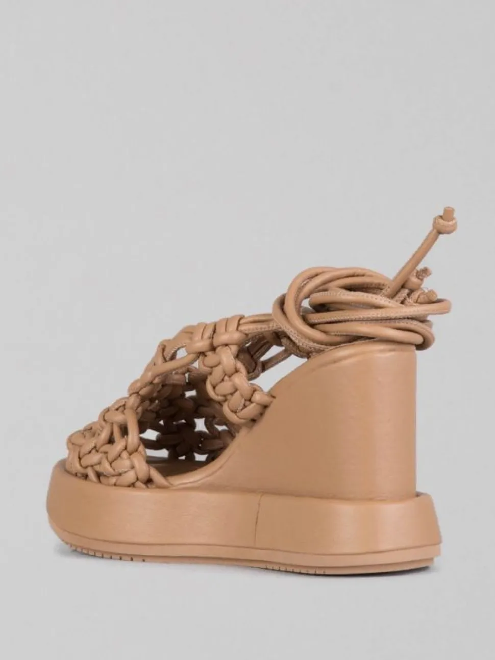 SANDALI ALTI IN PELLE INTRECCIATA CON ZEPPA