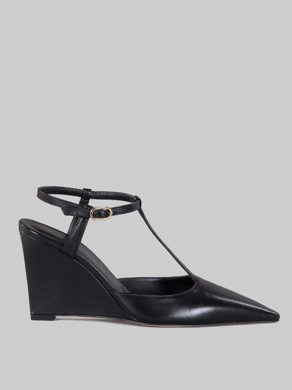 Slingback affusolata con zeppa