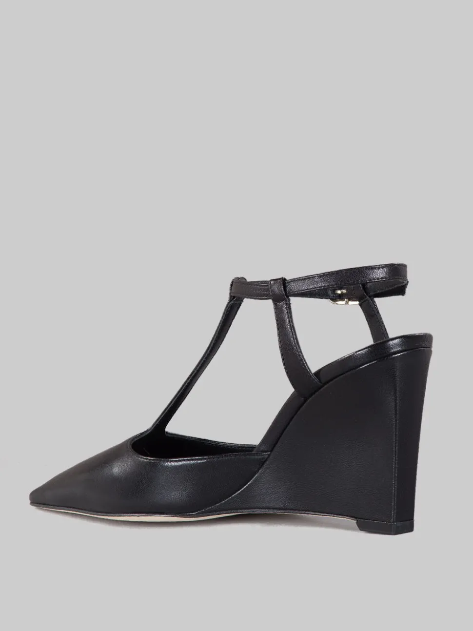 Slingback affusolata con zeppa