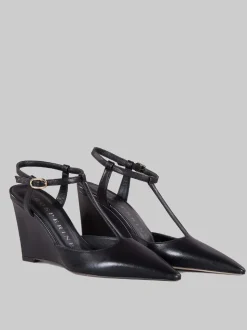 Slingback affusolata con zeppa