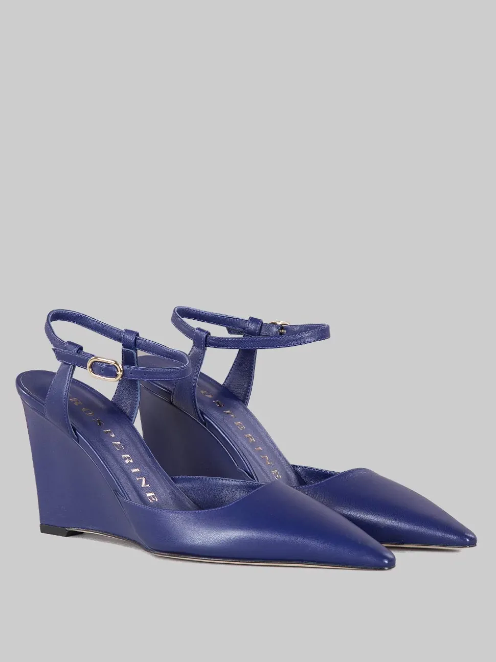 Slingback affusolata con zeppa