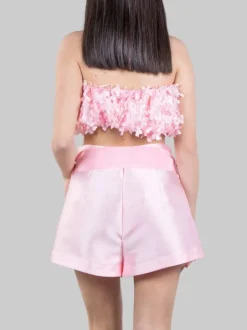 TOP A FASCIA ELASTICIZZATO ROSA DECORATO CON PETALI DI FIORI IN TESSUTO