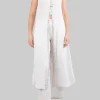 TOP LUNGO SMANICATO BIANCO CON PERLE